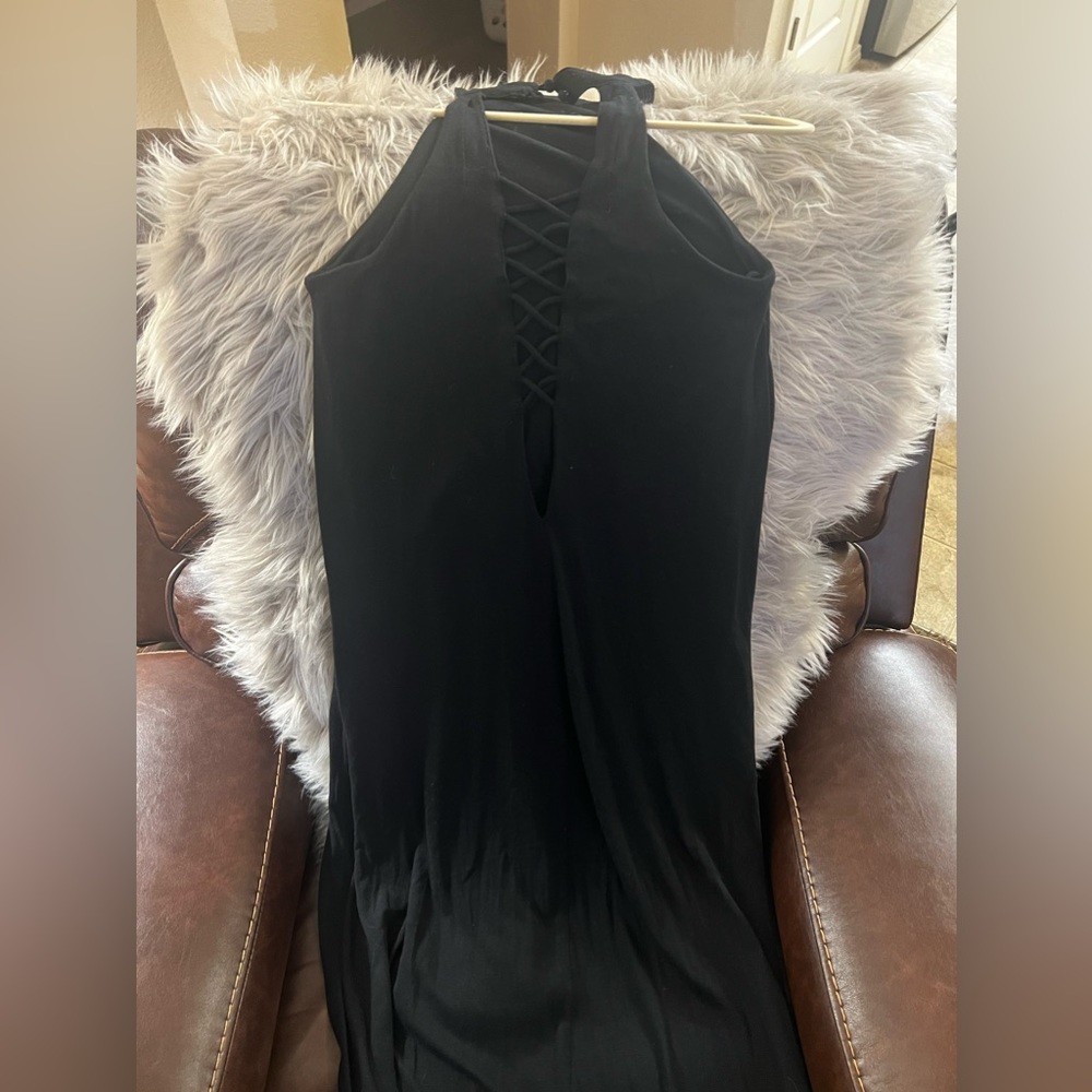 Express Black top. Short from front long from back with a cute design.